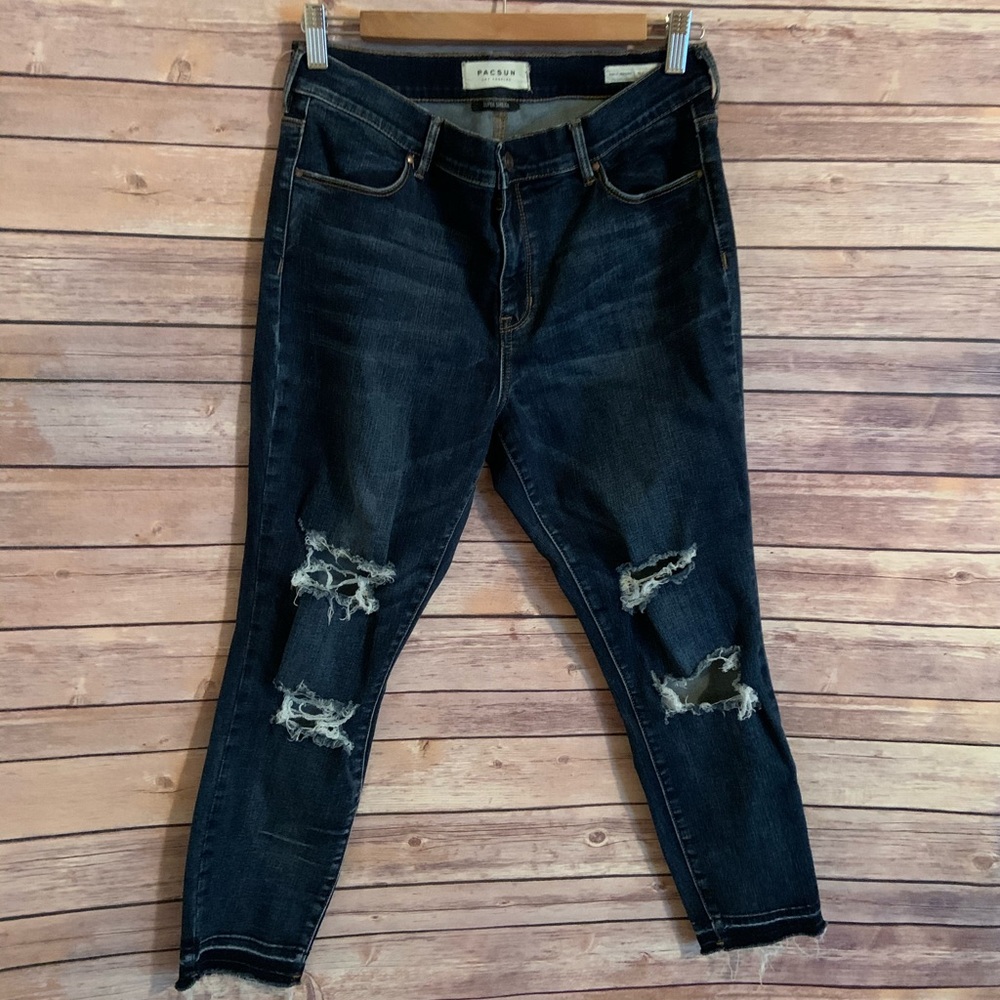 PacSun woman distressed jeans 30s